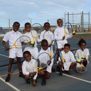 Kids playing tennis in South Africa